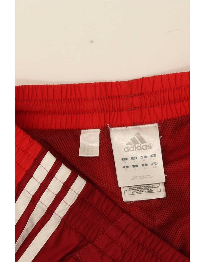Pantaloni da tuta da uomo Adidas Joggers poliestere rosso medio