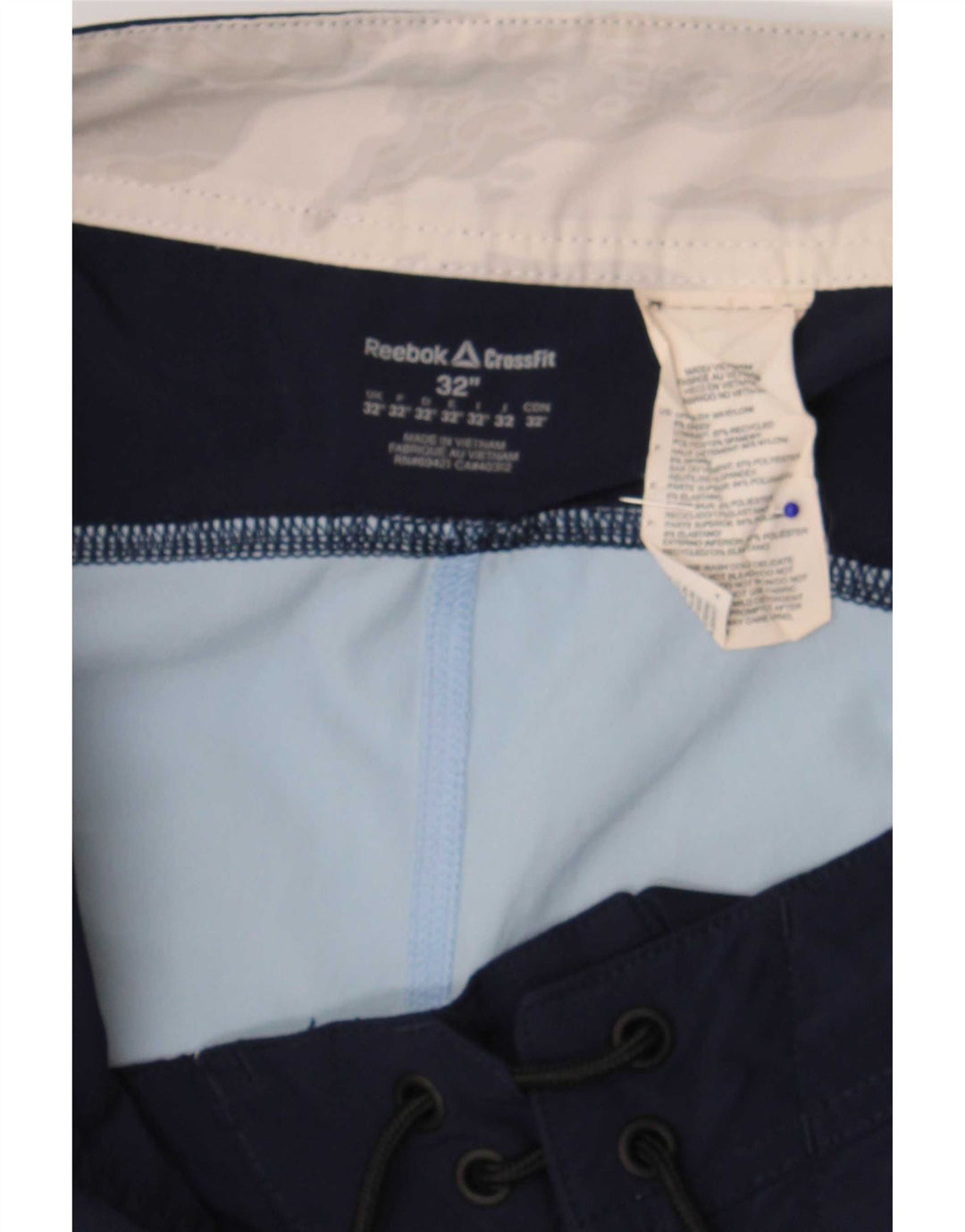 Pantaloncini da bagno grafici da uomo Reebok in nylon color block blu medio