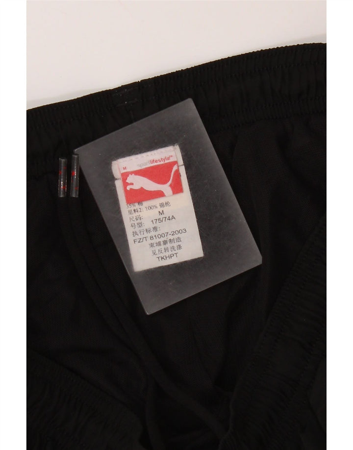 Pantaloni da tuta da donna Puma Joggers UK 12 Medium Nero
