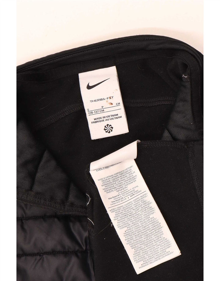 Top della tuta da ginnastica Nike Therma-Fit con collo e zip per ragazzi 8-9 anni, piccola, nera