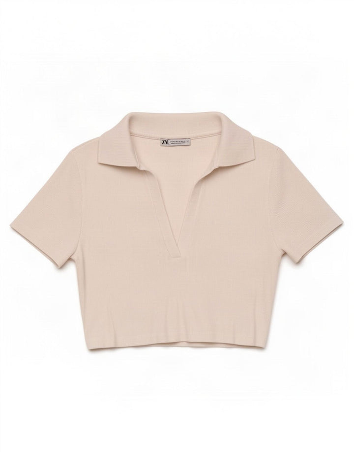 Polo corta da donna Zara UK 12 bianca media