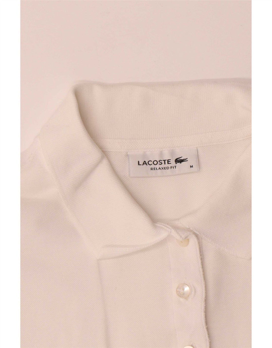 Polo da donna vestibilità rilassata Lacoste UK 14 cotone bianco medio