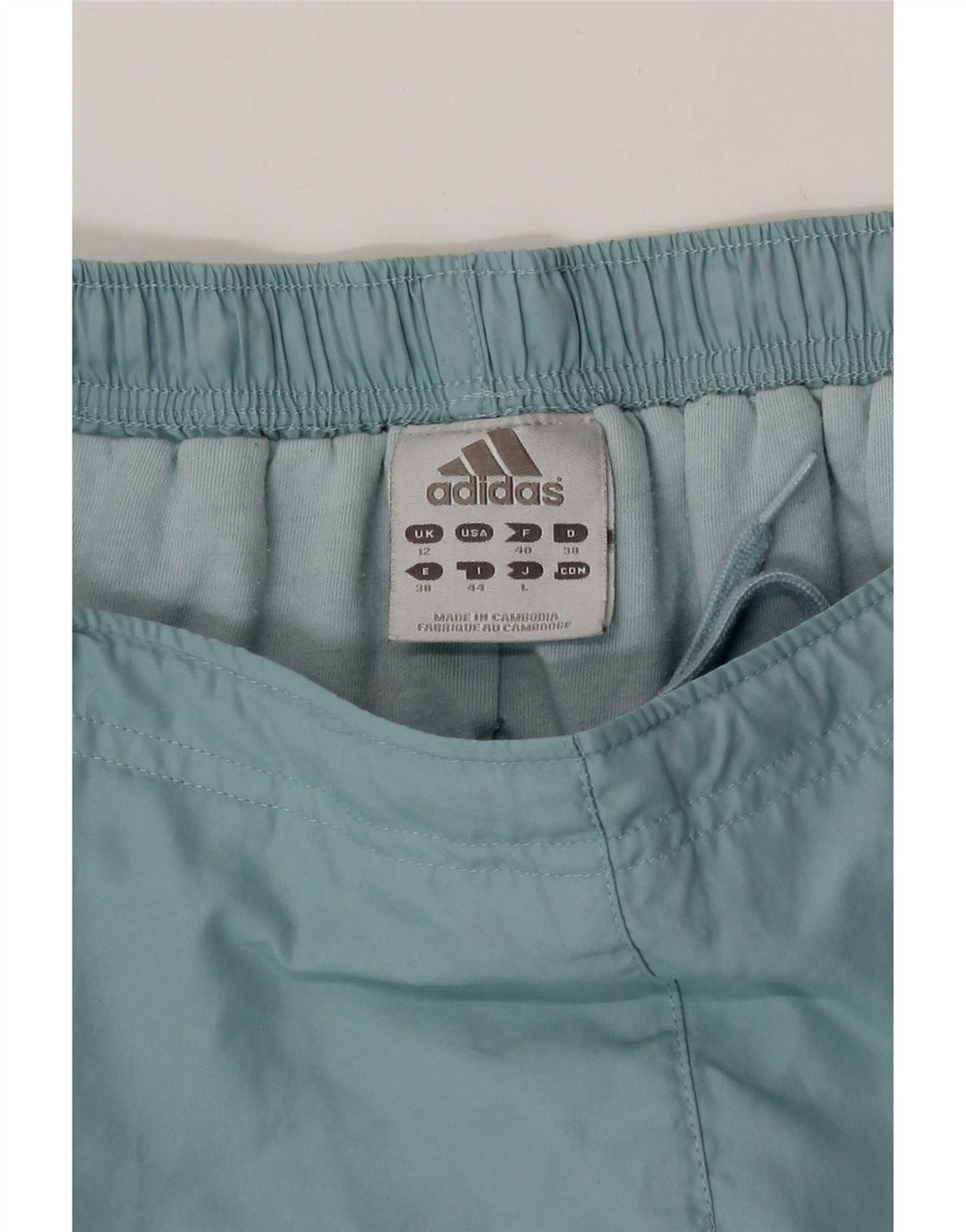 Pantaloni giacca a vento da donna Adidas UK 12 poliestere blu medio