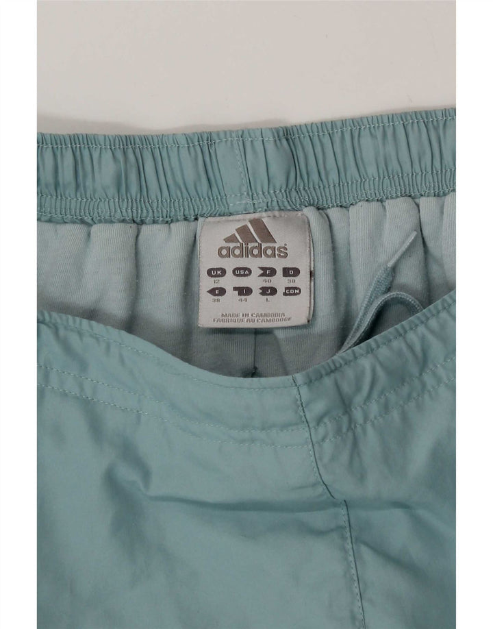 Pantaloni giacca a vento da donna Adidas UK 12 poliestere blu medio