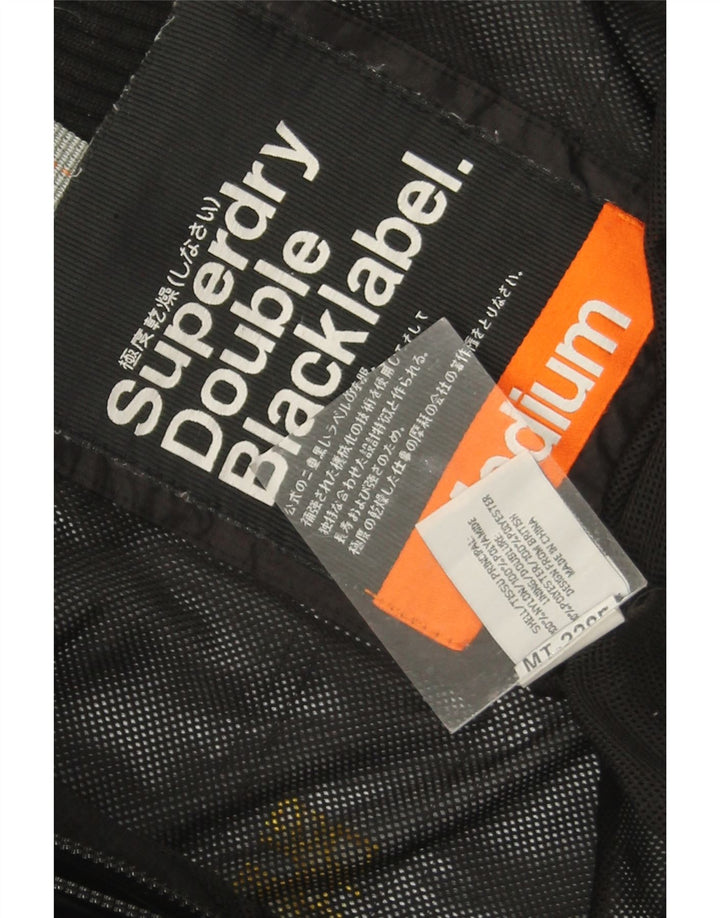 Giacca a vento da donna Superdry UK 14 nylon nero medio