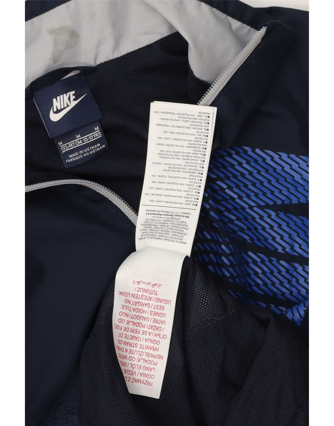 Giacca superiore della tuta da ragazzo Nike 10-11 anni color block blu navy medio