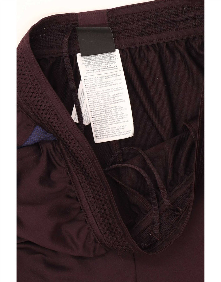 Pantaloni della tuta da uomo Nike Barcelona, poliestere color block medio nero