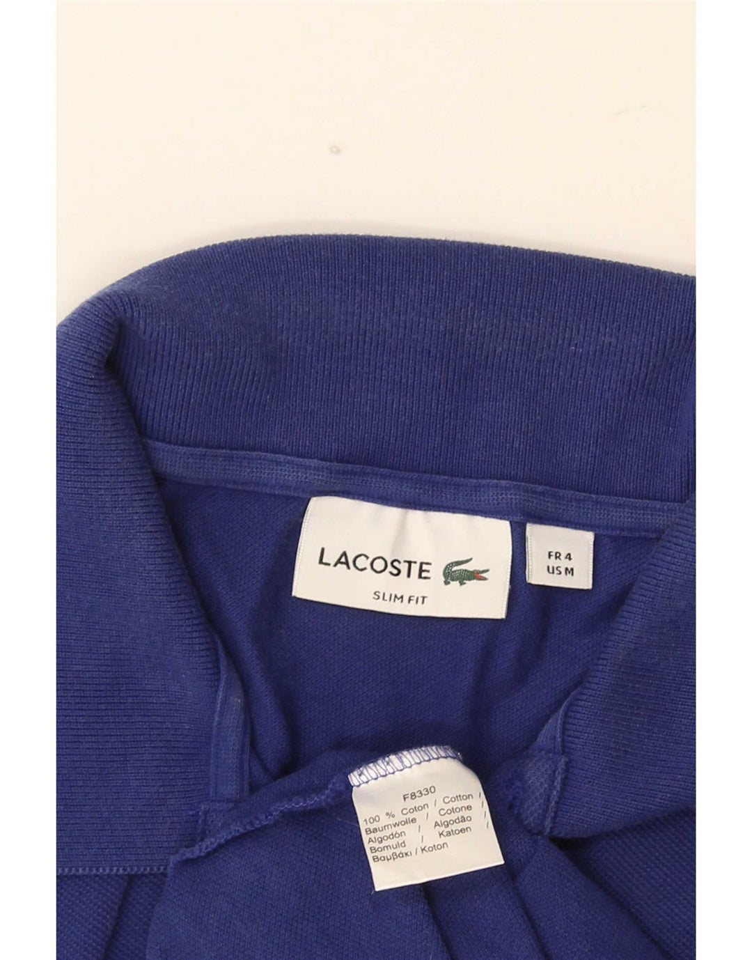 Polo da uomo slim fit Lacoste taglia 4 in cotone blu medio