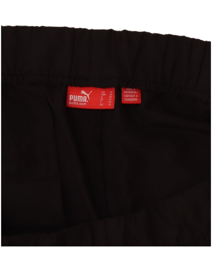 Pantaloncini sportivi Bermuda da donna Puma UK 12 medio neri