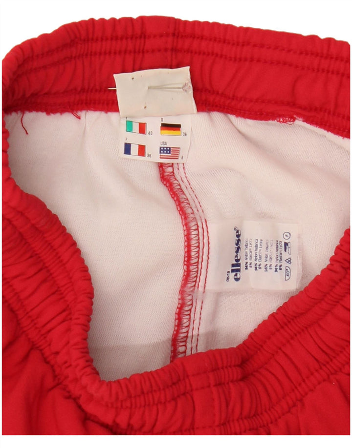 Pantaloni Ellesse da donna con staffa antivento US 6 nylon rosso medio