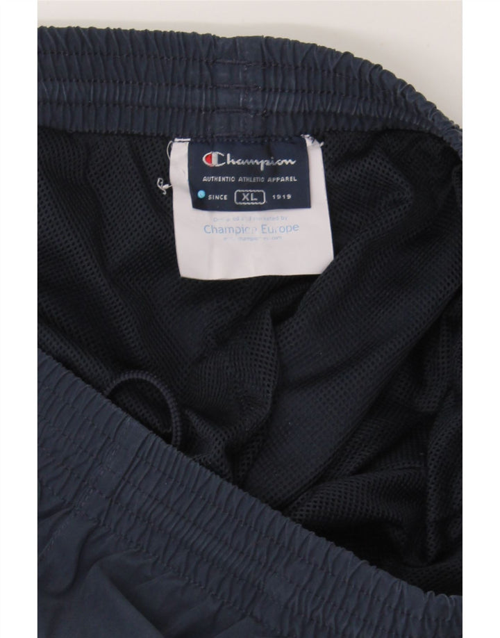 CHAMPION Mens Tracksuit Trousers XL  Navy Blue Polyester Vintage Champion and Second-Hand Champion from Messina Hembry 