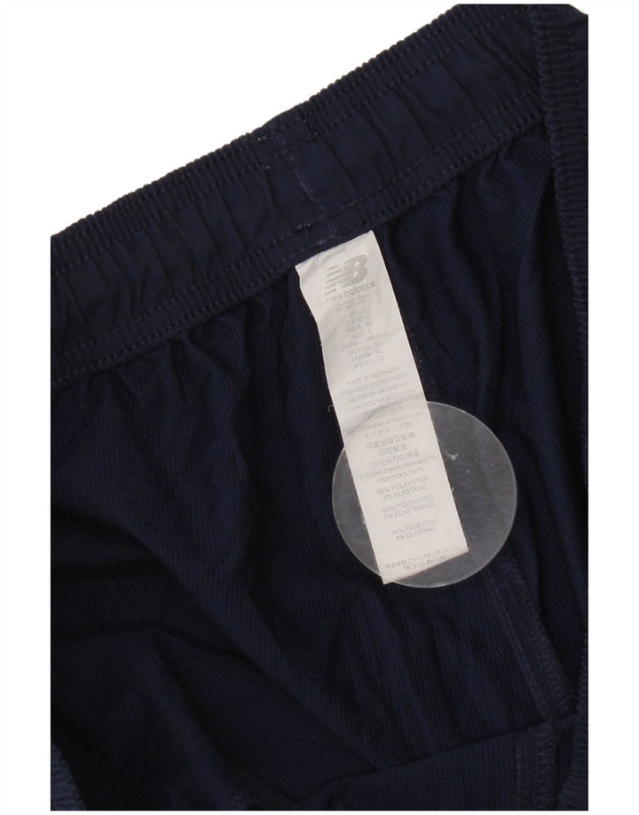 Pantaloni da tuta da uomo New Balance Large in poliestere blu navy