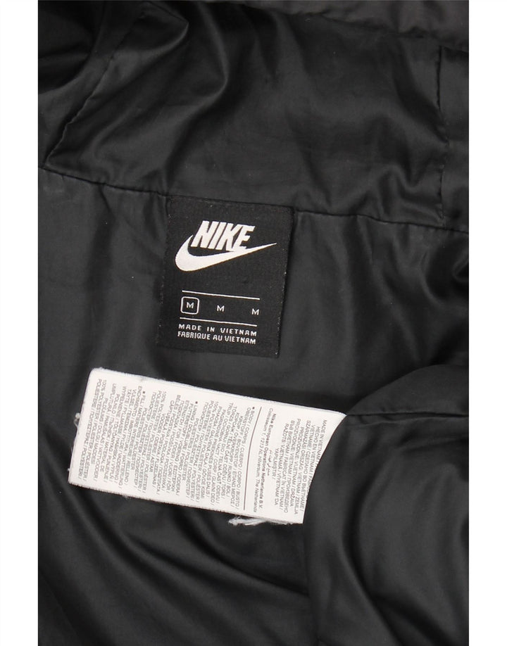 Giacca imbottita con cappuccio grafico Nike da ragazzo 10-11 anni medio poliestere nero