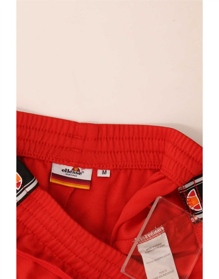 Pantaloni da tuta grafica da uomo Ellesse Poliestere color block rosso medio