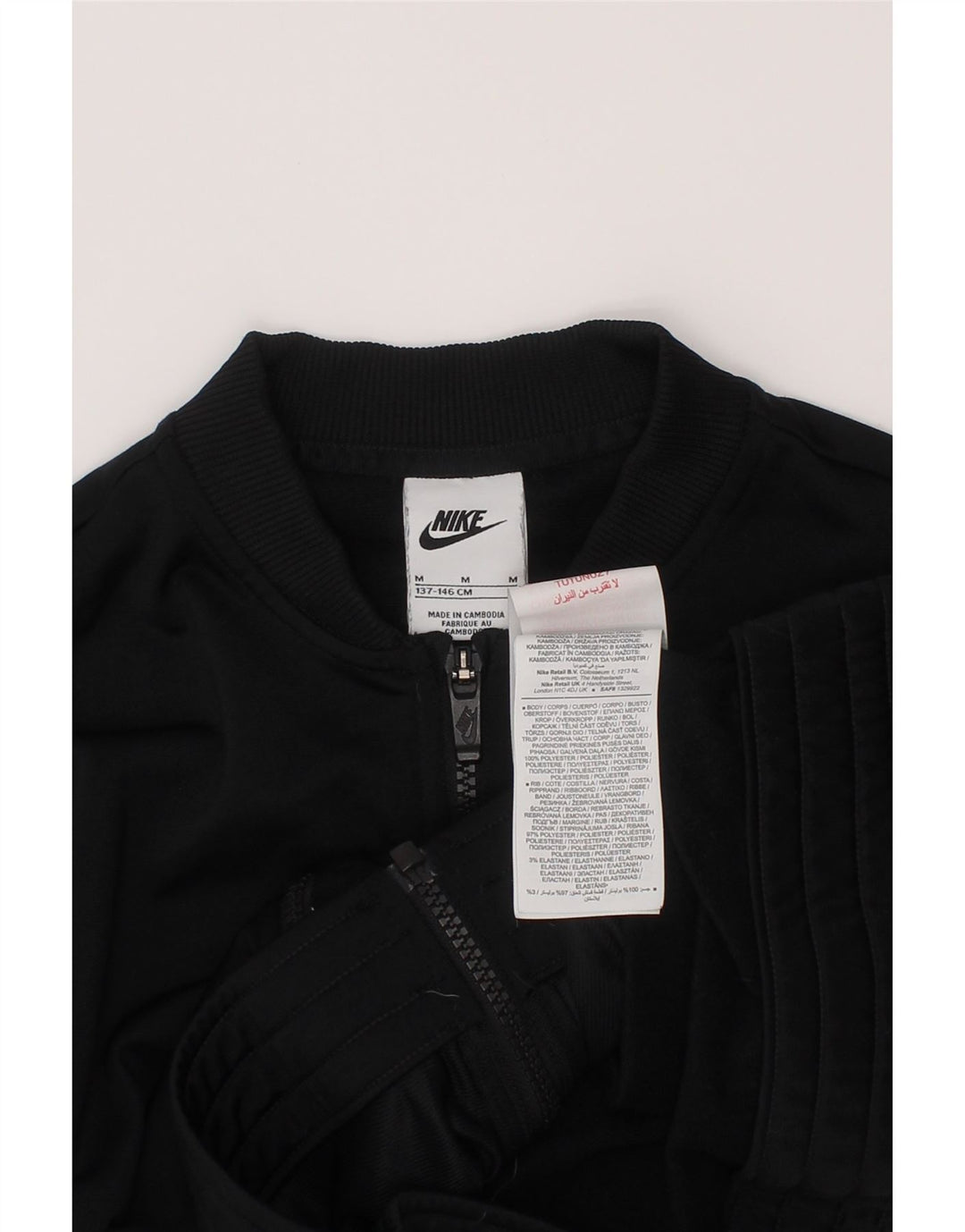 Giacca superiore della tuta da ragazza Nike 10-11 anni blocco colore nero medio