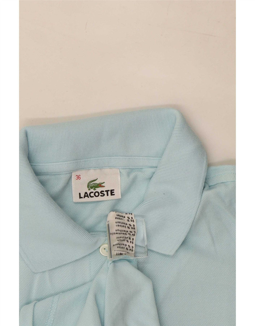 Polo da donna Lacoste taglia 36 piccola in cotone blu