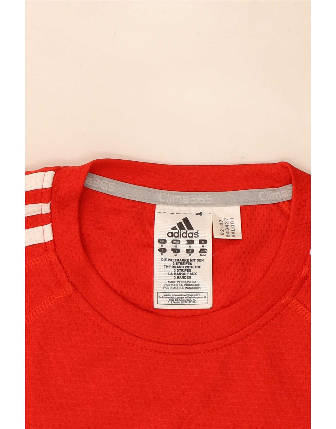 T-shirt grafica Adidas Kruger da uomo Top in poliestere rosso medio
