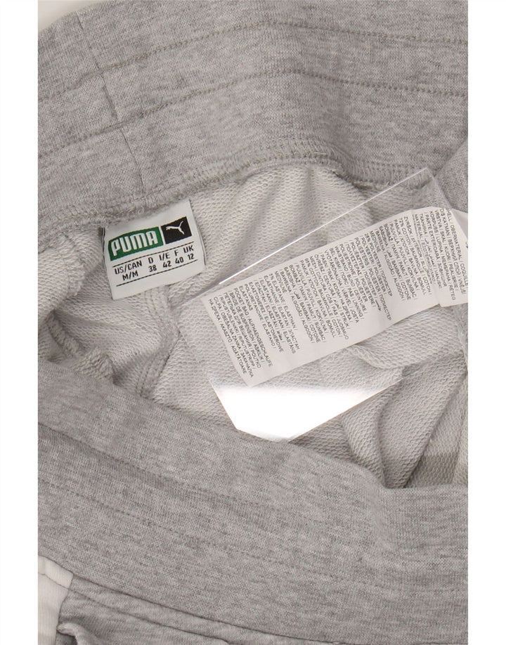 Pantaloni da tuta da donna PUMA Joggers UK 12 Colorblock grigio medio