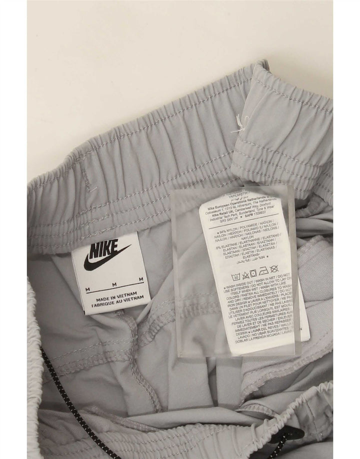 Pantaloni da tuta Nike Graphic Cargo da uomo, da jogging, in nylon grigio medio