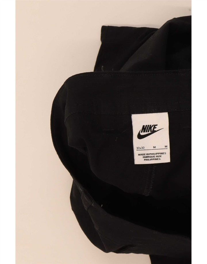 Pantaloni cargo affusolati Nike da uomo W32 L32 in cotone nero