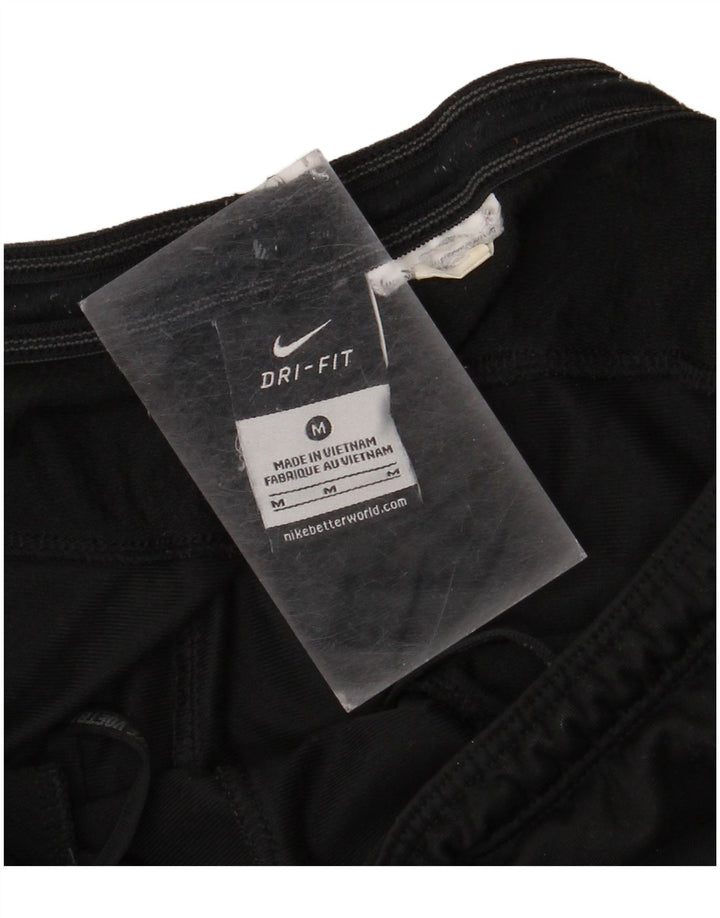 Pantaloni da tuta Nike Dri Fit da uomo color block medio nero