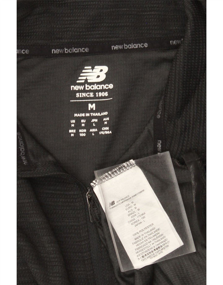Top da tuta pullover con zip e collo da uomo New Balance, poliestere nero medio