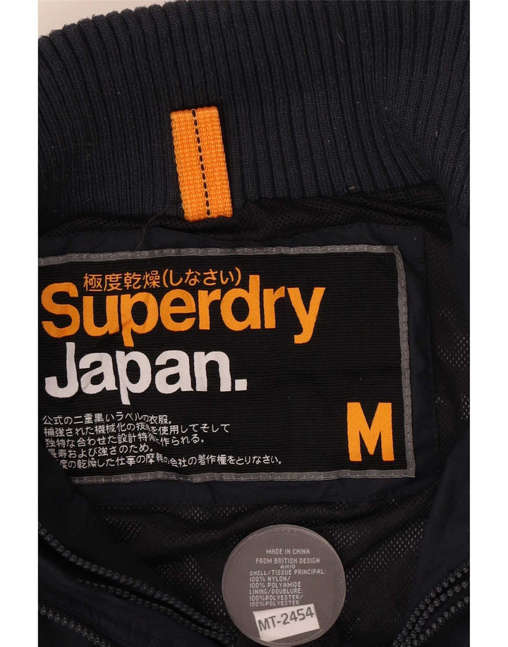 Giacca antipioggia grafica da donna Superdry UK 14 nylon blu navy medio